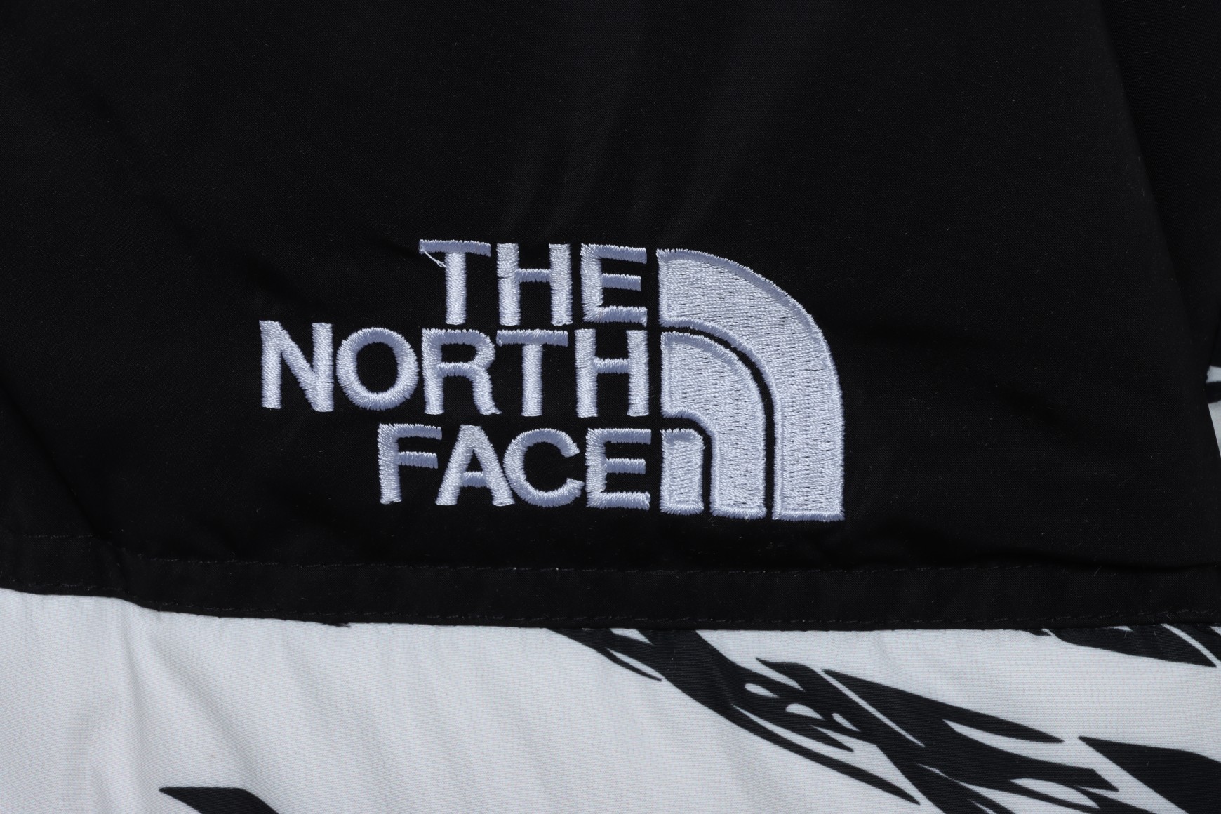 White ‘ZebraLogoPattern’ Down Jacket